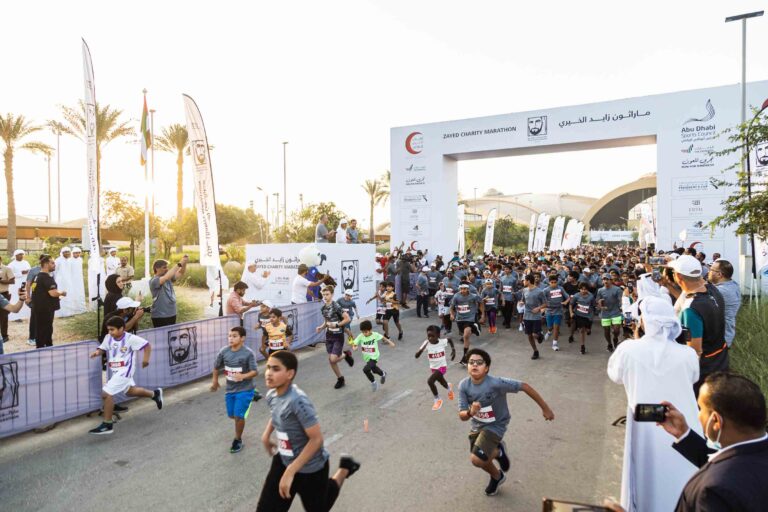 Children running at Zayed Charity Marathon Abu Dhabi 2022