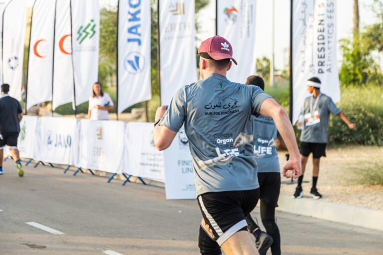 Runner running at Zayed Charity Marathon Abu Dhabi 2022