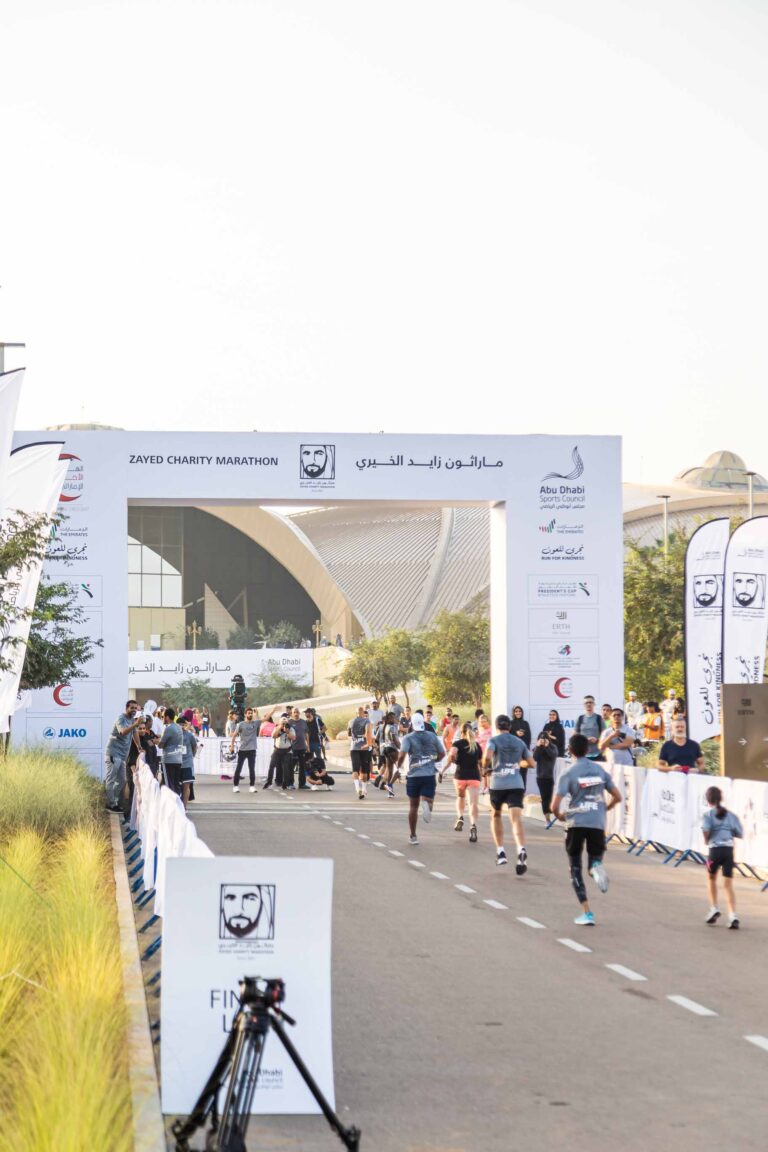 Runners completing the race at Zayed Charity Marathon Abu Dhabi 2022